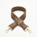 Close-up of geometric woven replacement shoulder strap No. 22 with gold metal buckles - Khaki