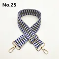 Detail of adjustable woven geometric blue and white bag strap with gold metal hooks - Blue