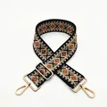 Detail of adjustable geometric patterned bag strap with gold metal lobster clasps - Style 4 Brown (Silver Buckle)