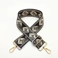 Detail of geometric jacquard shoulder strap with gold metal buckles and lobster clasps - a5 Light Grey