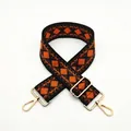 Detail view of Style 11 geometric rhombus pattern replacement strap with gold hardware hooks - Style 11 Orange (Silver Buckle)