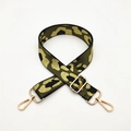 Detail view of army green fabric leopard print shoulder strap with gold metal hardware - Green