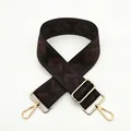 Close-up of adjustable geometric jacquard bag strap with gold metal lobster clasps - a9 Deep Coffee