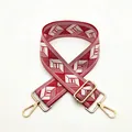 Detail of red and white geometric jacquard bag strap with adjustable gold metal buckle - a12 Red
