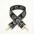 Detail of adjustable geometric diamond pattern bag strap with gold metal lobster clasps - a21 Black
