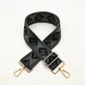 Detail of adjustable wide shoulder strap with green diamond pattern and gold hardware - a23 Green 1