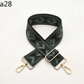 Detail of adjustable woven bag strap in dark green and black with gold hardware - a28 Green 2