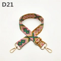 Detalle de la correa tejida de colores con cierres de mosquetón y hebillas doradas - D21 Naranja Amarillo
