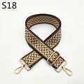 Macro shot of yellow and brown zigzag woven strap with shiny gold metal lobster clasps - Khaki