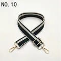 Close-up of adjustable striped bag strap with green and white pattern and gold buckles - No.10 Green
