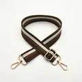 Detail of adjustable No. 12 brown and white striped bag strap with gold metal hooks - No.12 Coffee