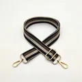 Close-up of color-block striped bag strap with premium gold metal lobster clasps - No.13 Black