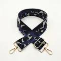 Detail of wide leopard print bag strap with blue jacquard and gold metal lobster clasps - No.35 Blue Leopard (Silver Buckle)