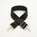 Macro detail of zebra pattern thickened adjustable shoulder strap with gold metal hooks - No. 48 Green