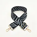 Detailed view of zebra pattern wide replacement strap with gold metal swivel hooks - Silver Clasp / No. 51 Light Blue