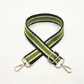 Detail of adjustable green and black striped shoulder strap with gold metal hooks - No.2 Green