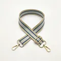 Adjustable woven strap for bags with blue and beige stripes and gold metal hooks - Beige