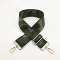 Detail of wide adjustable green camouflage bag strap with light gold metal lobster clasps - Silver Clasp / Green Camouflage