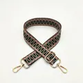 Detail of woven bag strap with pink geometric diamond pattern and gold metal hooks - Silver Clasp / Pink and Green