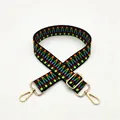 Close-up of woven bag strap No. 51 with ethnic wave patterns and gold metal buckles - Dark Green