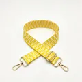 Detail of yellow and white woven replacement shoulder strap with gold metal swivel hooks - Yellow