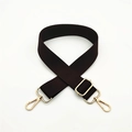 Close-up of adjustable thick nylon bag strap with polished gold-tone metal lobster clasps - Brown