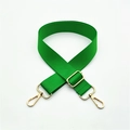 Detail view of thickened green canvas bag strap with golden metal spring hooks - Emerald Green