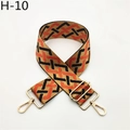 Detail view of adjustable geometric weave strap with gold hardware and lobster clasps - Orange Black Khaki (H-10 Black Orange)