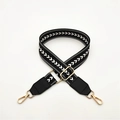 Detail of adjustable black and white herringbone woven strap with gold metal lobster clasp - Black