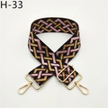 Detail view of ethnic geometric adjustable woven bag strap with golden metal swivel hooks - Black Pink Pattern (H-33)