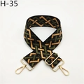 Close-up of wide geometric woven bag strap with green and black patterns and gold buckles - Army Green Pattern (H-35)