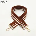 Close-up of brown and white striped fabric strap with golden metal swivel hooks - Brown (Style 7)
