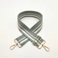 Detail of adjustable gray and white striped bag strap with gold metal hooks and buckle - Matcha Green (Style 12)