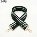 Close-up of dark green canvas strap with white stripes and gold metal hardware - Green (Style 14)
