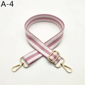 Close-up of pink and white striped woven bag strap with golden lobster clasps - Pink (A-4)