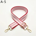Detail view of red, pink, and white striped strap with polished gold metal swivel hooks - Watermelon Red (A-5)