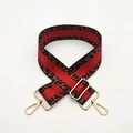 Detail of adjustable leopard print bag strap with red stripes and gold metal lobster hooks - No.6 Red Striped Leopard (Gold Buckle)