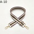 Detail view of striped woven bag strap with golden metal swivel hooks and buckles - Pink Khaki Striped (A-10)
