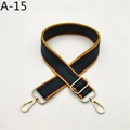Close-up of adjustable striped fabric strap with gold hardware and A-15 serial code - Yellow (A-15)