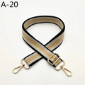 Close-up of adjustable black white gold striped bag strap with shiny gold lobster clasps - Black Yellow Striped (A-20)