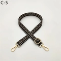 Detail of adjustable chevron strap with golden swivel hooks and thick cotton weave - Black (C-5)