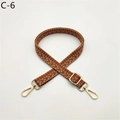 Detail of adjustable woven bag strap with orange and green chevron pattern and gold metal hooks - Silver Clasp / Orange Khaki (C-6)