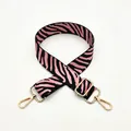 Detail of pink zebra print replacement bag strap with golden lobster clasps and slider - No. 11 Pink Zebra