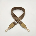 Close-up of adjustable diamond pattern purse strap with gold hooks and brown leather details - Khaki