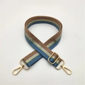Adjustable brown and blue striped bag strap with gold metal hooks on white background - Lake Blue Pink Stripe