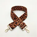 Close-up of leopard print bag strap with golden lobster clasps and metal buckle detail - Dark Leopard (No. 2)
