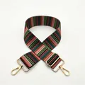 Close-up of adjustable striped bag strap with gold metal hooks and multi-color pattern - Striped (No. 4)