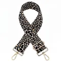 Detail of adjustable leopard print bag strap with golden metal snap hooks and buckles - Black Leopard