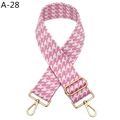 Detail of pink houndstooth jacquard bag strap with adjustable golden metal hardware - Silver Clasp / Pink (A-28)