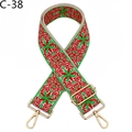 Detailed view of red and green ethnic embroidered bag strap with golden metal hooks - C-38 Green Red Floral